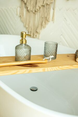 stylish-bathroom-interior-boho-style-bathroom-has-shelf-brushes-soap-body-oils_352502-613