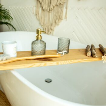 stylish-bathroom-interior-boho-style-bathroom-has-shelf-brushes-soap-body-oils_352502-613