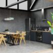 interior-spacious-kitchen-with-concrete-wall-3d-rendering_41470-3590