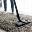 people-housework-housekeeping-concept-close-up-woman-with-legs-vacuum-cleaner-cleaning-carpet-home_231208-13612-1