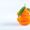 sliced orange isolated on white background