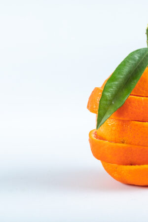 sliced orange isolated on white background