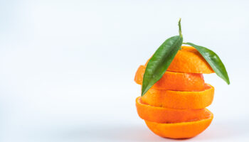 sliced orange isolated on white background